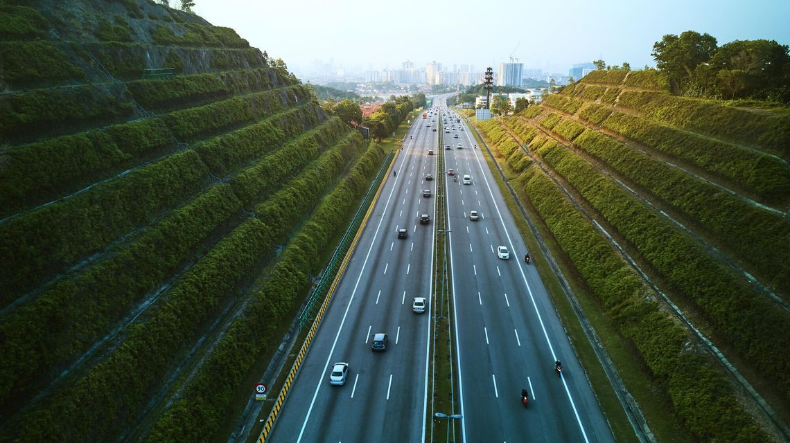 Aerial of highway leading into Kuala Lumpur, Malaysia.