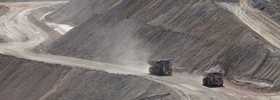 Mining trucks on a working site