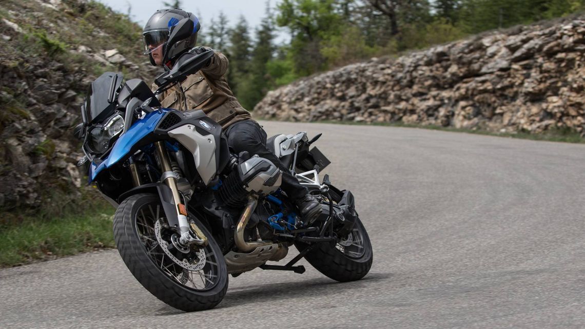 Motorcycle cornering on a negative crossfall