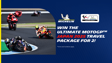 Motocycle riders on a circuit fitted with Michelin tyreson the left and win a trip to Japan to see the MotoGP for 2