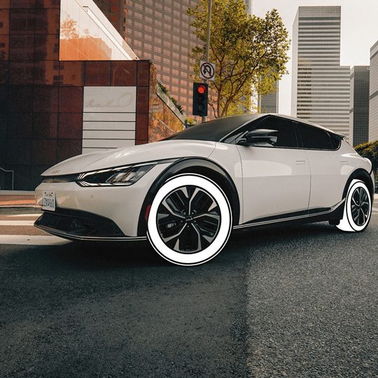 Four-wheel drive vehicle on rugged terrain emphasizing tire durability.