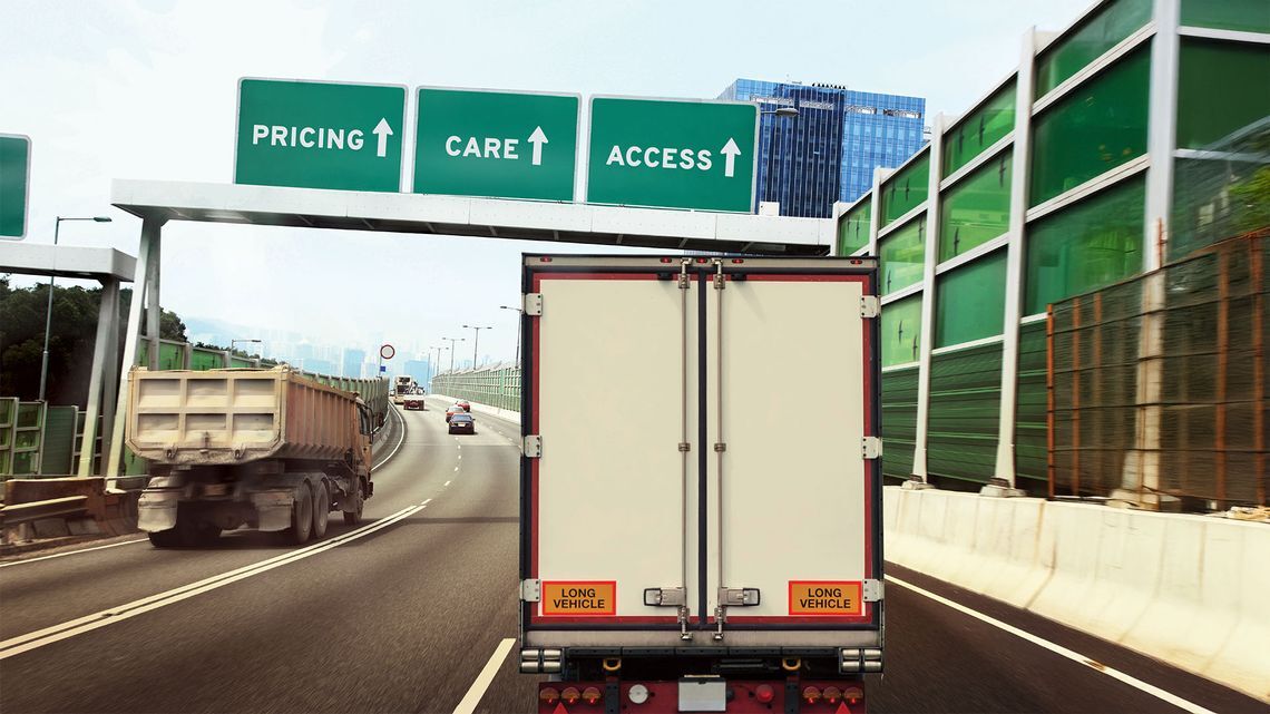 Image showing B2B vehicles on a freeway with road sign choices for the BFGoodrich Advantage Program
