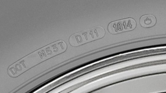 Image of magnified DOT (Department of Transportation Identification Number)