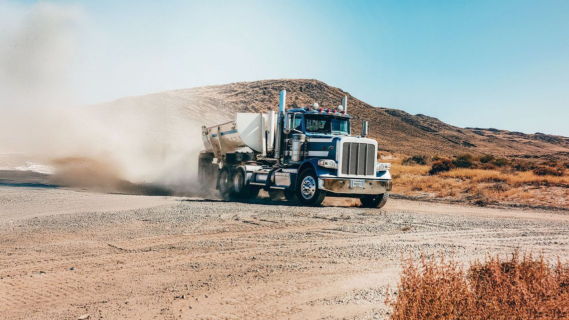 Image of a dump truck in the desert with BFGoodrich truck tires.